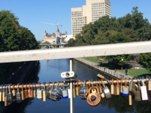 Illustration: Photo of locks on pedestrian bridge over Rideau Canal in downtown Ottawa